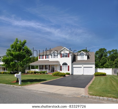 Suburban Two Story Two Car Garage Home Driveway Mailbox