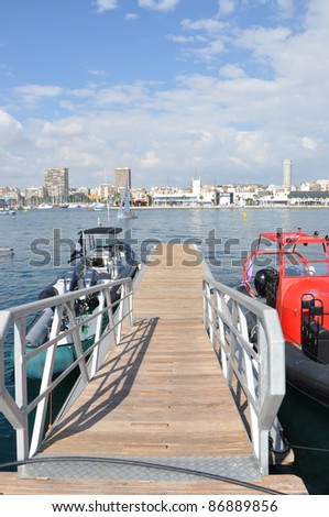ALICANTE, SPAIN - OCT 16:  PROTECTOR Boats of Auckland, New Zealand and USA Team Puma boats are docked at 2011-2012 Volvo Ocean Race village dock in Alicante Oct 16, 2011.
