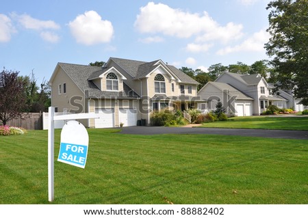 Suburban Neighborhood Home Realtor Sign on Front Yard Lawn Sunny Blue Cloud Sky Day