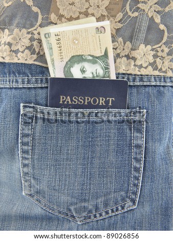 Argentina Peso Currency in American Passport Booklet in Denim Blue Jean Pocket