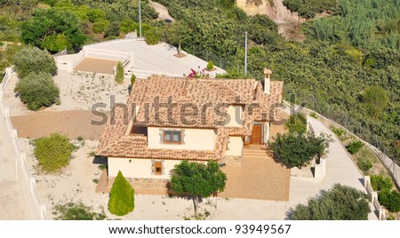 Suburban Mediterranean Spanish Style Home in Suburban Neighborhood
