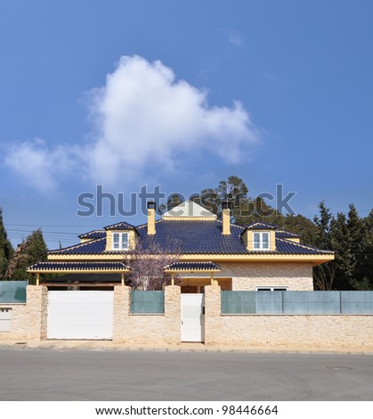Suburban Mediterranean Style Home Entrance on blue sky sunny day in Spain Europe