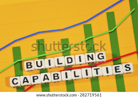 Business Term with Climbing Chart / Graph - Building Capabilities