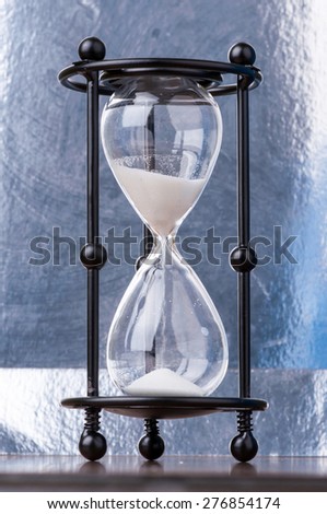 sand watch isolated on silver background