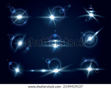 Realistic lens flare effects. Sunshine reflexes. Optical abstract shining. Glare types. Rays glowing. Flash lights. Blue glint. Spotlight beam reflection. Vector
