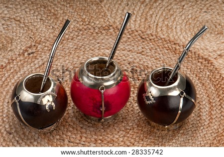 Group of calabash mate cups with straws.,Mate is a traditional drink very similar to tea in Argentina, Uruguay, Paraguay and some parts of Brazil.