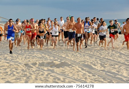 FORT LAUDERDALE, FLORIDA - APRIL 16: Competitors starts to run in the 5K Barefoot Marathon in Fort Lauderdale April 16, 2011.