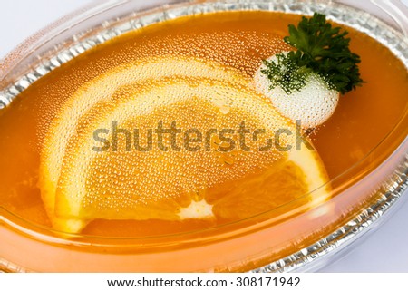 Water droplets on the lid, orange cake white background