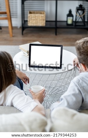 Similar – Image, Stock Photo Unrecognizable man resting at poolside