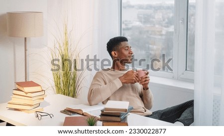 Similar – Image, Stock Photo Black man with book on train platform