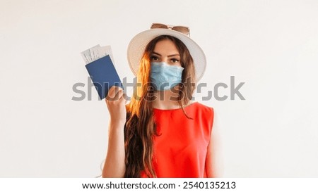 Similar – Image, Stock Photo Serious passengers in protective masks during their train trip