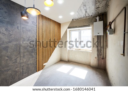 New kitchen before renovation works and after, creative combination of black wallpaper and wood planks on wall, shiny tiles on the floor and different modern chandeliers hanging from ceiling Photo stock © 