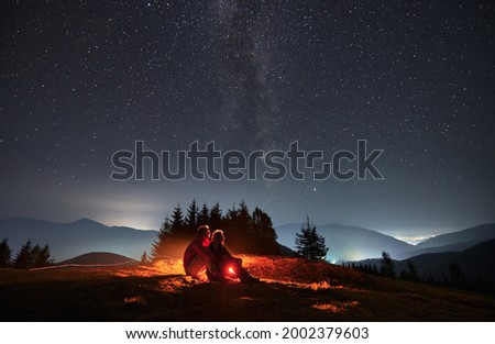 Similar – Foto Bild Tourist mit Blick auf Bergwasserfall