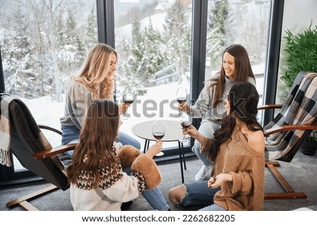 Similar – Image, Stock Photo Young woman enjoying wine near sea