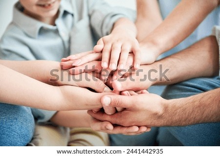 Similar – Image, Stock Photo Close up child hand holding a spring flower