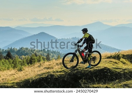 Similar – Image, Stock Photo man riding a bike, mode of transport doins exercise in Bilbao city Spain
