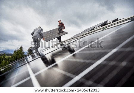 Similar – Image, Stock Photo Solar panels or photovoltaic module. Solar power for green energy. Sustainable resources. Renewable energy. Clean technology. Solar cell panels use sun light as a source to generate electricity.