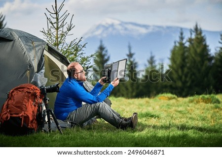 Similar – Image, Stock Photo Powerful mountains and cloudy sky view from window of car