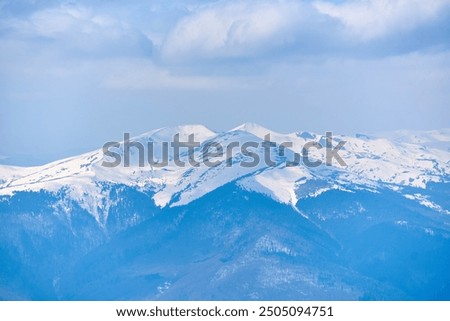 Similar – Image, Stock Photo Dark mountain range under cloudy sky in twilight