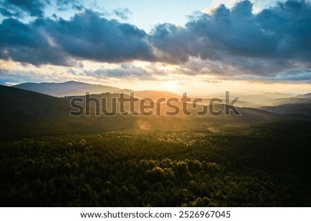 Similar – Foto Bild Sonnenuntergangshimmel über Hügeln in der Wüste