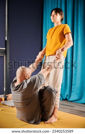 Similar – Image, Stock Photo Male therapist doing procedures with client in clinic