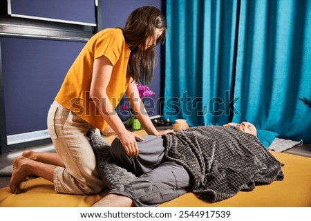 Similar – Image, Stock Photo Male therapist doing procedures with client in clinic