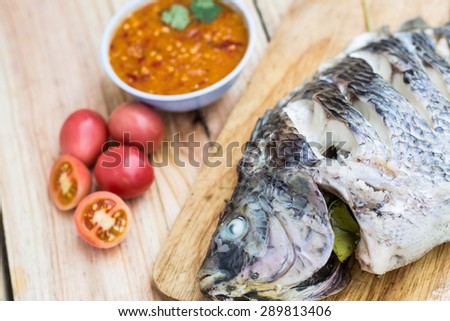 Steamed fish paste on wood