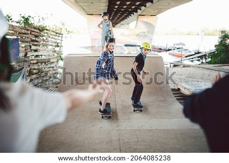 Similar – Foto Bild Kinderskateboardfahrer bei einer Skateboardfahrt.