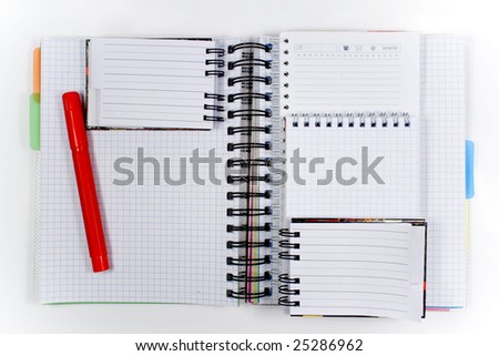 Five opened notebooks with with black and white spiral