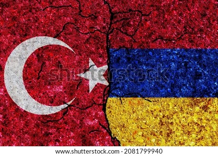 Turkey and Armenia painted flags on a wall with grunge texture. Turkey and Armenia conflict. Armenia and Turkey flags together. Turkey vs Armenia