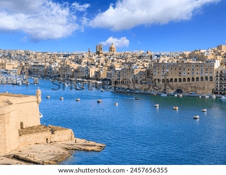 Similar – Image, Stock Photo Panoramic view of Valletta Skyline at beautiful sunset from Sliema with churches of Our Lady of Mount Carmel and St. Paul’s Anglican Pro-Cathedral, Valletta, Capital city of Malta