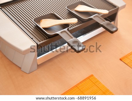 raclette cutlery prepared on table ready to use