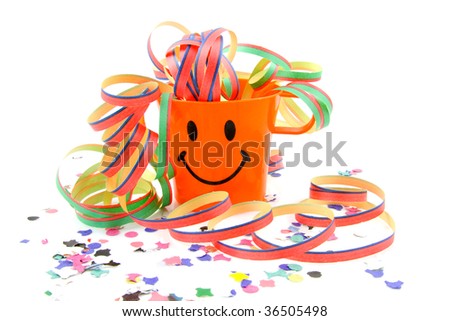 Orange party cup with streamers and confetti over white background