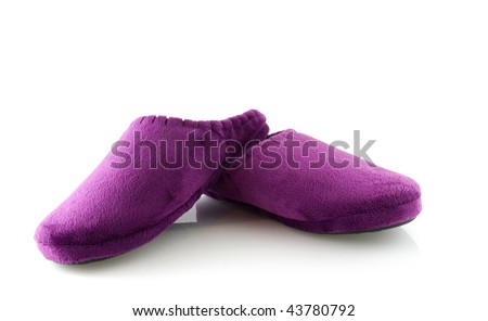 Pair of purple slippers isolated on white background