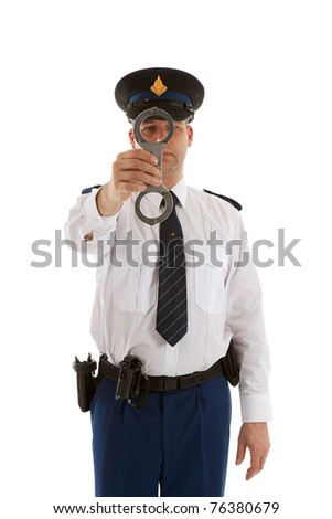 Police Officer Is Showing Handcuffs Over White Background Stock Photo ...