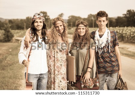 Hippie Group Walking on a Countryside Road