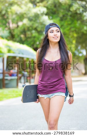 https://image.shutterstock.com/display_pic_with_logo/308011/279838169/stock-photo-beautiful-girl-walking-at-park-holding-a-skateboard-she-is-half-caucasian-and-half-filipina-she-279838169.jpg