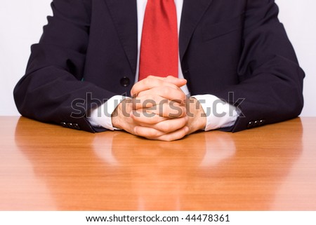 businessman seated at the table