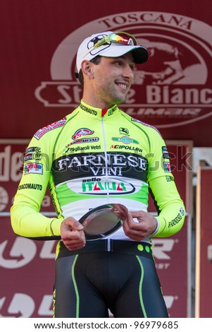 SIENA, ITALY - MARCH 03: Oscar Gatto on the podium of Strade Bianche 2012, on March 03, 2012 in Siena, Italy