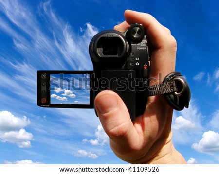 a man takes off sky a video camera