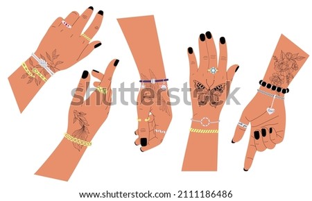 Vector set of female hands in rings and bracelets with black manicure and tattoos. Tattoo flowers, fish, bird, butterfly.