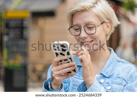 Similar – Image, Stock Photo Young woman with short brunette hair looks out the window behind the glass