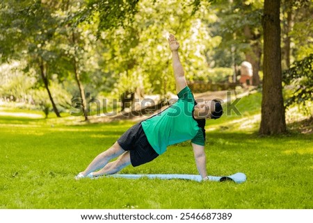 Similar – Image, Stock Photo Male making yoga exercise near window