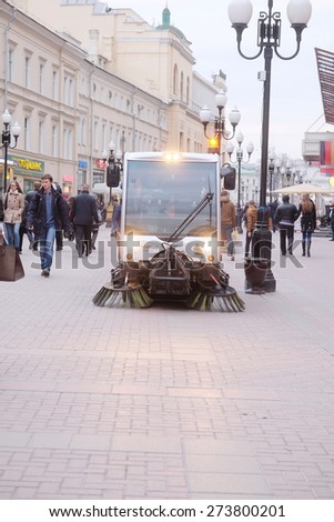 MOSCOW, RUSSIA - APRIL 22, 2015: Sweeping machine cleans the street in Moscow