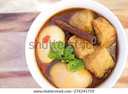 Vegetarian Thai food called Pa lo ,pha-lo phalo Eggs and fried tofu boiled in brown soup