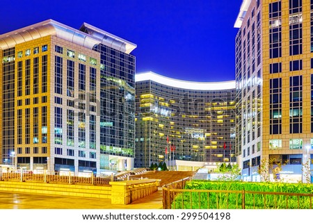 BEIJING, CHINA - MAY 18, 2015: Modern office and residential buildings on the streets of Beijing, transport and ordinary urban life of the city.