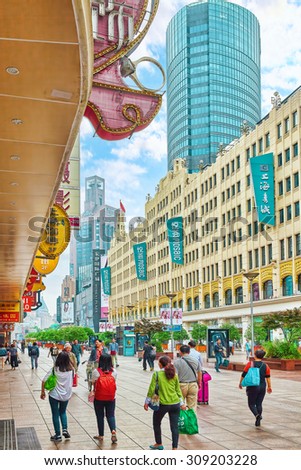 SHANGHAI, CHINA - MAY 24, 2015:Beautiful view of Shanghai street Nanjing Lu. Shanghai street Nanjing Lu has many modern malls, shops, cafes, restaurants and places for interesting spend a time.