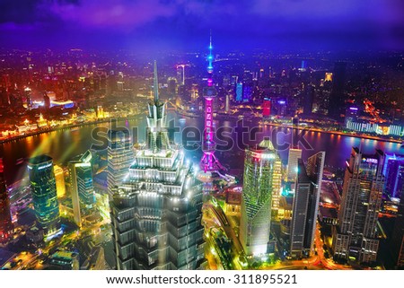 SHANGHAI,CHINA -MAY 24,2015.Oriental Pearl Tower at the nighttime.Tower 470 meter the Oriental Pearl is one of Shanghai\'s tallest buildings,located at Lujiazui finance zone in Pudong district.