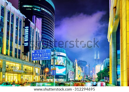 SHANGHAI, CHINA - MAY 23, 2015:Beautiful view of Shanghai street Nanjing Lu. Shanghai street Nanjing Lu has many modern malls, shops, cafes, restaurants and places for interesting spend a time.