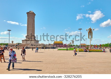 BEIJING, CHINA - MAY 19, 2015: People near Monument to the People\'s Heroes on Tian\'anmen Square - the third of largest square in the world, Beijing, China
